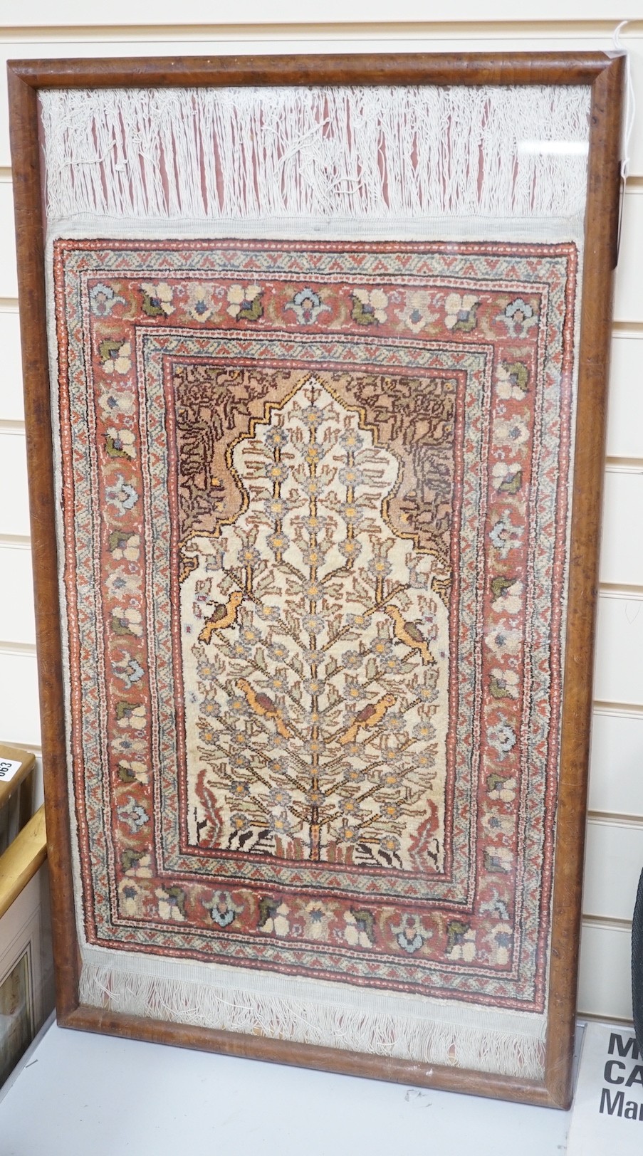 A framed Hereke prayer mat - 75 x 40cm